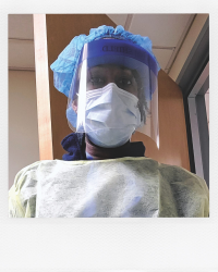 Nurse wearing face mask.